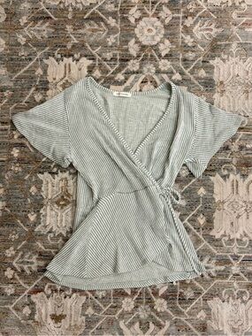 Green and white tie blouse